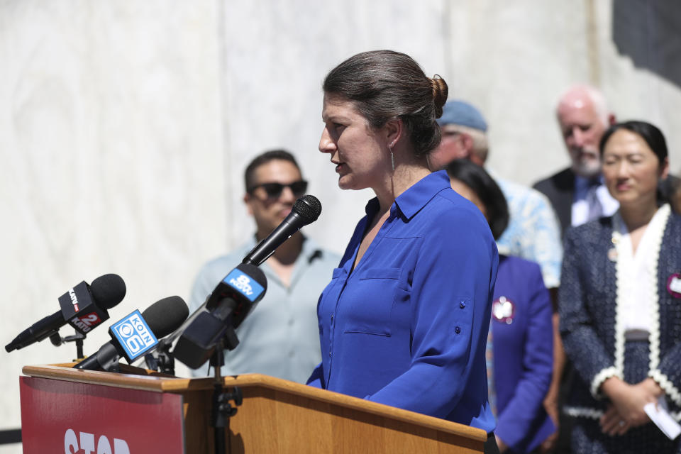 Democratic Rep. Courtney Neron speaks during a news conference and rally against the Republican Senate walkout at the Oregon State Capitol in Salem, Ore., Tuesday, June 6, 2023. (AP Photo/Amanda Loman)