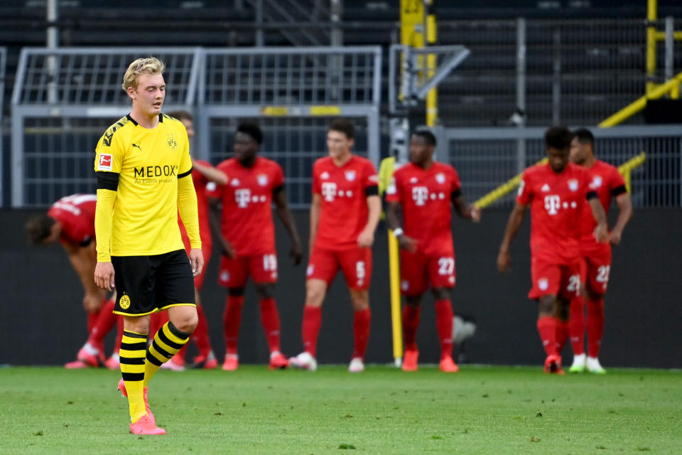 Bayern Munich (background) has walled off the Bundesliga title from Julian Brandt and Borussia Dortmund yet again. (Photo by Federico Gambarini/Pool via Getty Images)