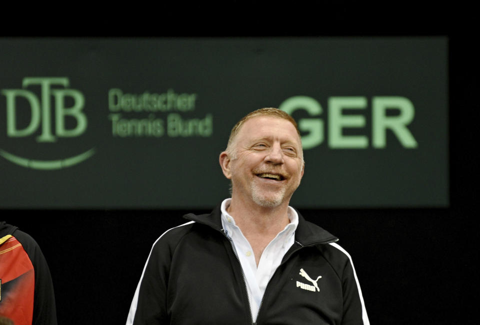 Boris Becker assists the team in the players' area during the Davis Cup, qualifying round tennis match, between Germany and Switzerland, in Trier, Germany, Friday, Feb. 3, 2023. (Harald Tittel/dpa via AP)