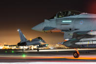 Image of a pair of RAF Typhoons waiting to taxi out and depart from RAF Akrotiri on an Op SHADER night mission (Picture: UK MOD/Crown 2019)