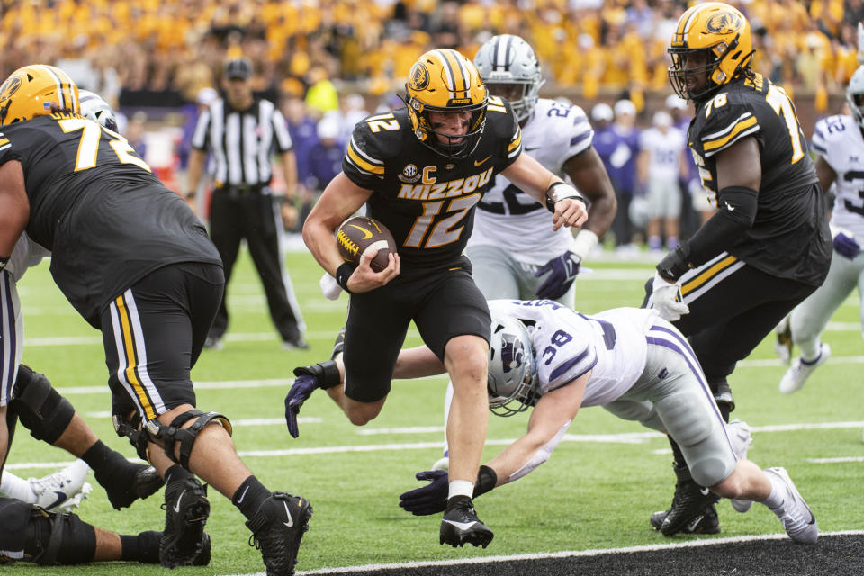 Missouri quarterback Brady Cook scores a touchdown during the second quarter of an NCAA college football game against Kansas State, Saturday, Sept. 16, 2023, in Columbia, Mo. (AP Photo/L.G. Patterson)