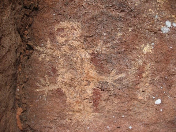 Researchers surveying pig-like animals called peccaries in Brazil discovered inadvertently discovered ancient drawings of animals, like the reptile shown here.