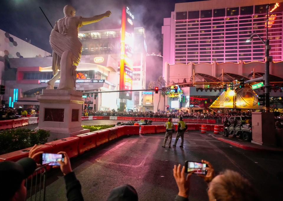 Nov 5, 2022; Las Vegas, Nevada, USA; Mercedes -AMG Petronas driver Lewis Hamilton leaves the track during the Formula One Las Vegas Grand Prix Launch Party at Las Vegas Strip. Mandatory Credit: Ray Acevedo-USA TODAY Sports