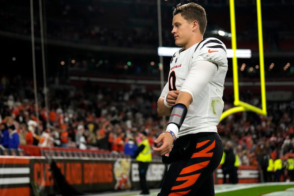 Bengals quarterback Joe Burrow walks off the field at the conclusion of a loss in Cleveland.