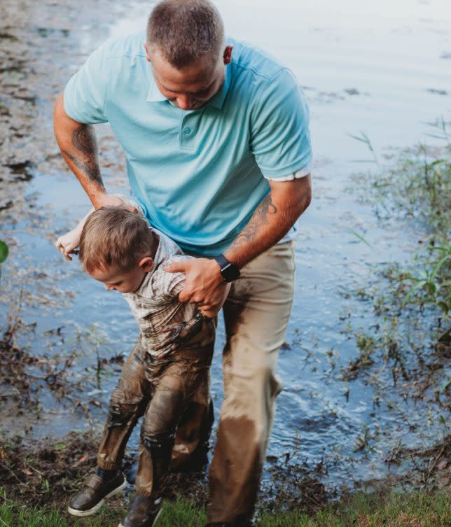 The little boy ran into the muddy river before his family could catch him. [Photo: Caters]