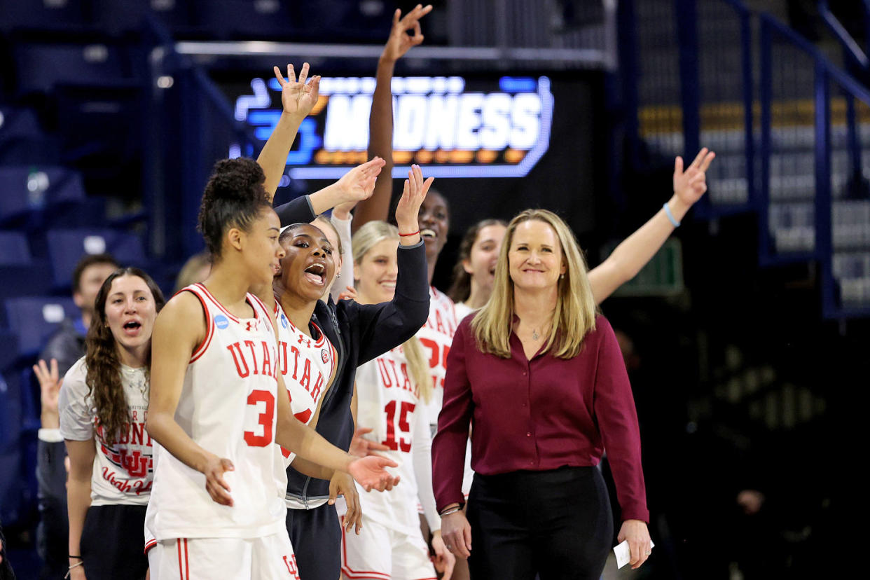 The Utah Utes celebrate after a basket against South Dakota State  in the first round of the NCAA Women's Basketball Tournament  on March 23, 2024. (Steph Chambers / Getty Images)