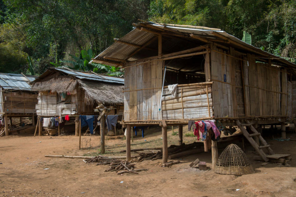 Traditional houses on stilts made from bamboo in Ban Muangkeo Village, a cultural heritage village on the Mekong River in Laos.<span class="copyright">Wolfgang Kaehler—LightRocket/Getty Images</span>