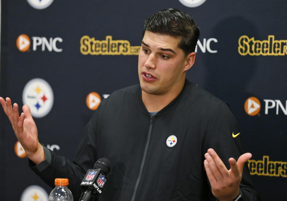 Pittsburgh Steelers quarterback Mason Rudolph answers questions during a news conference after the team's NFL football game against the Cleveland Browns, early Friday, Nov. 15, 2019, in Cleveland. The Browns won 21-7. (AP Photo/Ron Schwane)