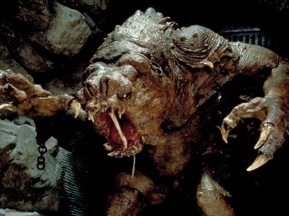 The Rancor eating a bone in Jabba's Palace.