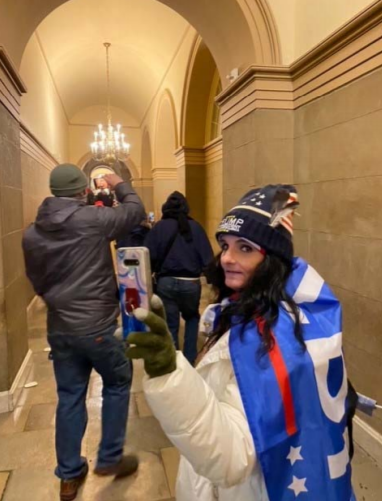 Tammy Bronsburg of Williamsport was allegedly photographed inside the U.S. Capitol on Jan. 6 with a Trump flag draped over her shoulders. This photograph is part of the evidence in FBI documents that allege she was part of the Capitol insurrection.