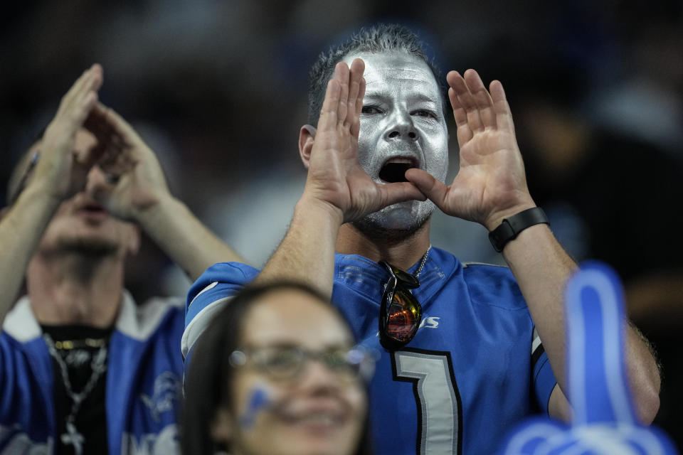 Fans cheer during the first half of a preseason NFL football game between the Detroit Lions and the Jacksonville Jaguars, Saturday, Aug. 19, 2023, in Detroit. (AP Photo/Paul Sancya)