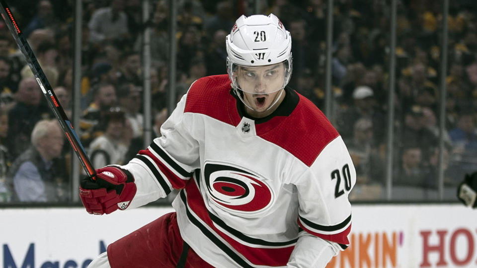 The Carolina Hurricanes' Sebastian Aho (20) celebrates after scoring against the Boston Bruins during the first period in Game 1 of the Eastern Conference finals on Thursday, May 9, 2019, at TD Garden in Boston, Mass. The Bruins won, 5-2. (Robert Willett/Raleigh News & Observer/TNS via Getty Images)