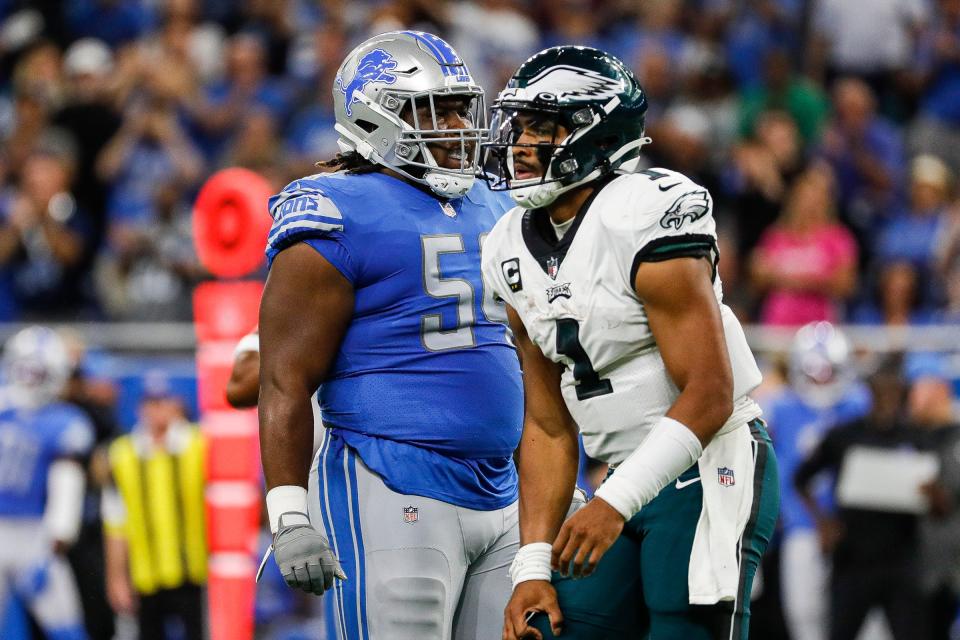 Detroit Lions defensive tackle Alim McNeill (54) reacts to a play against Philadelphia Eagles quarterback Jalen Hurts (1) during the first half at Ford Field, Sept. 11, 2022.