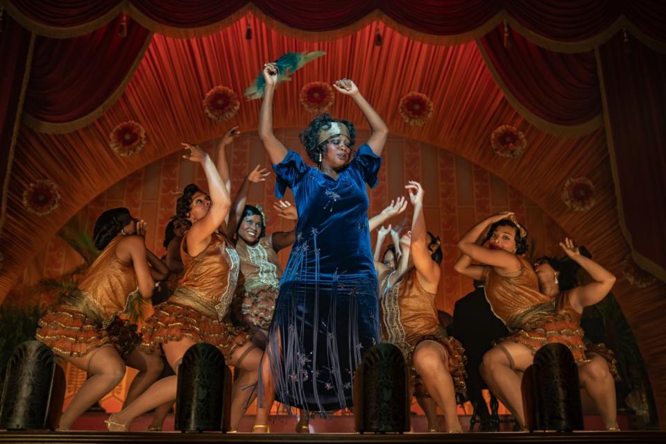 Viola Davis dances onstage with a group of backup dancers.