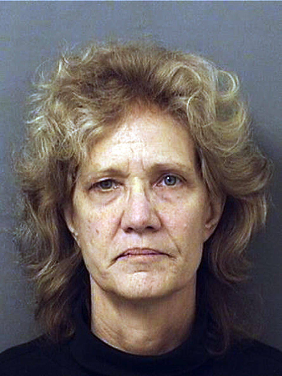 This undated photo provided by the Palm Beach County Sheriff's Office shows Amy Elizabeth Fleming, 60, of Dania, Fla. Fleming, who moved to Florida from the Las Vegas area a year after her 3-year-old mysteriously vanished more than 30 years ago, has been arrested on a warrant charging her with killing the boy, authorities said Monday, Feb. 11, 2019. (Palm Beach County Detention Center/Palm Beach County Sheriff's Office via AP)