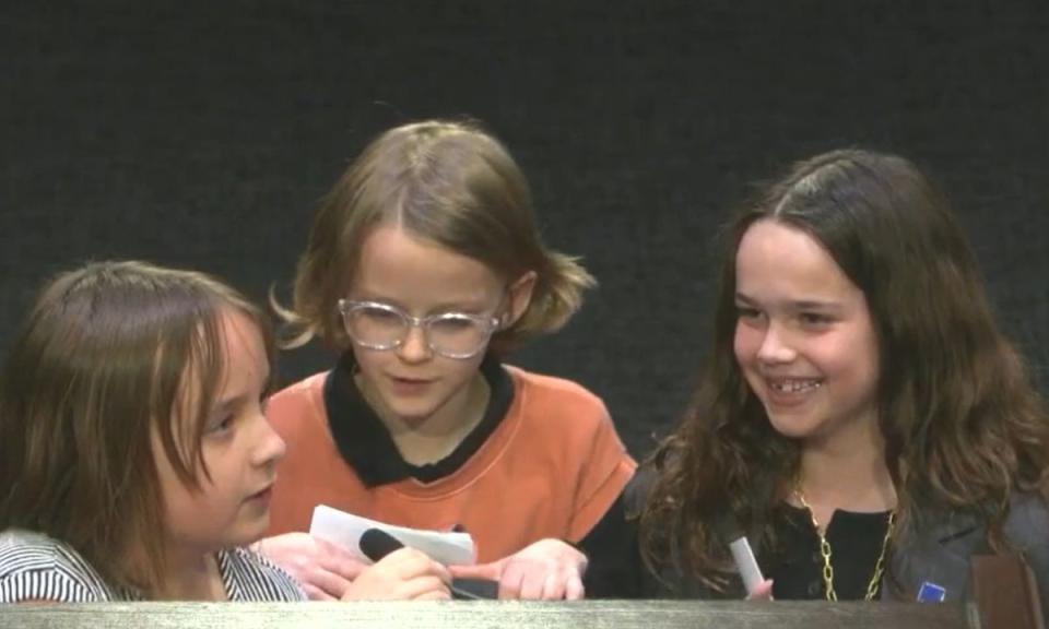 The Recess Rangers — (from left) June Simmons, Daphne Murray and Berkley Carter — speak at the February Cobb school board meeting in favor of longer recess times. (Cobb County School District)