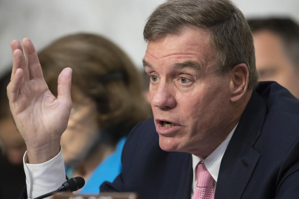 FILE - This Wednesday July 25, 2018 file photo shows Sen. Mark Warner, D-Va., vice-chair of the Senate Intelligence Committee, in Washington. Warner and Republican challenger Daniel Gade participated in a virtual debate in Northern Virginia earlier in the day. (AP Photo/J. Scott Applewhite)