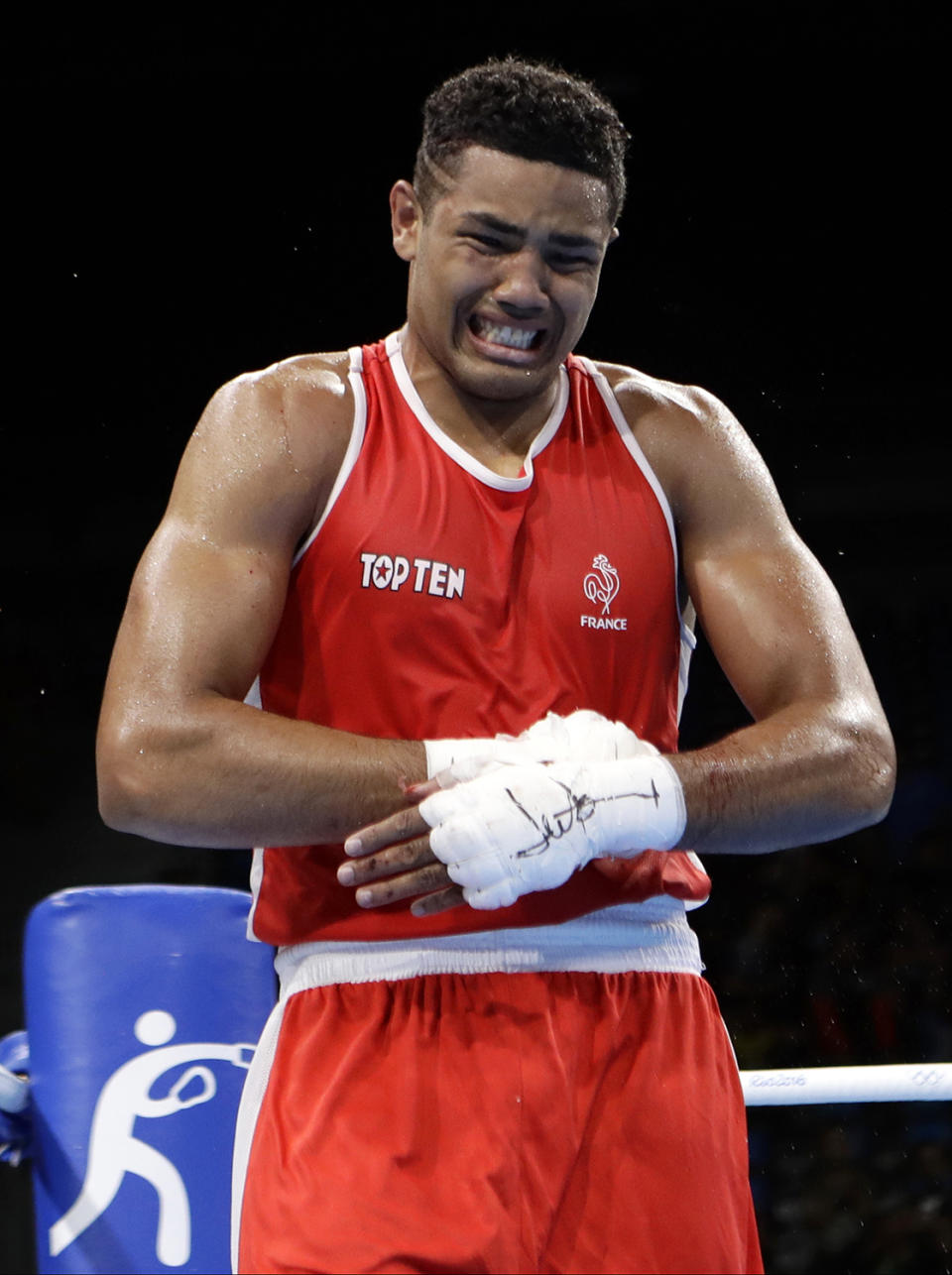 <p>France’s Paul Omba Biongolo cries after losing a match against Azerbaijan’s Abdullayev Abdulkadir during a men’s heavyweight 91-kg preliminary boxing match at the 2016 Summer Olympics in Rio de Janeiro, Brazil, Monday, Aug. 8, 2016. (AP Photo/Frank Franklin II) </p>