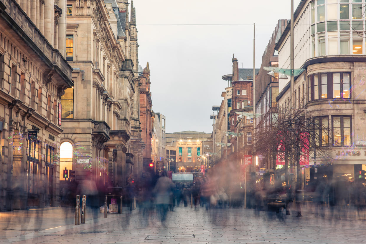 Glasgow / Scotland - February 15, 2019: a blur of shoppers and commuters during the evening rush hour on Buchanan street in the city centre