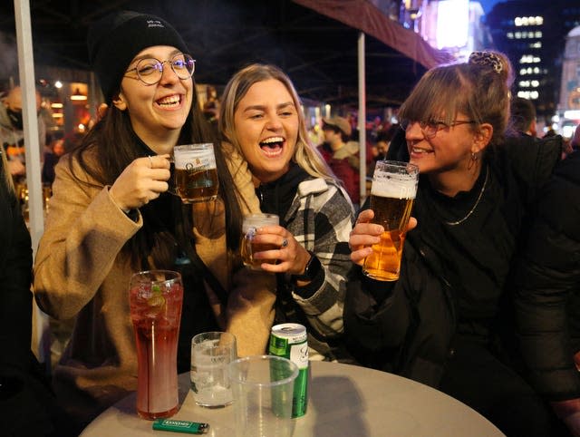 People gather for drinks and food in London