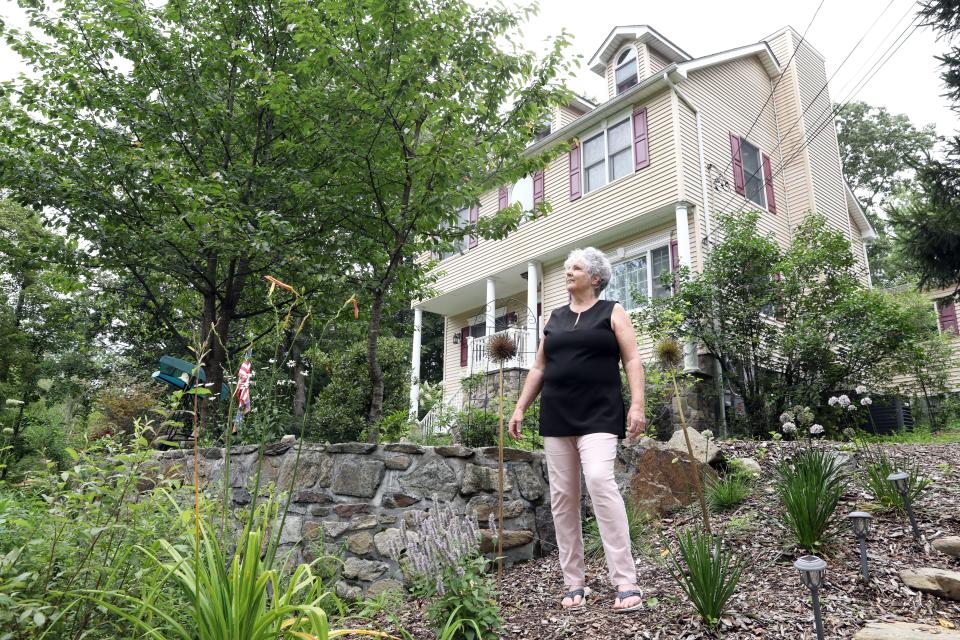 Longtime Continental Village resident Kathy Kourie is raising awareness of the inequities in the property tax system in Philipstown. She is photographed at home August 8, 2023.