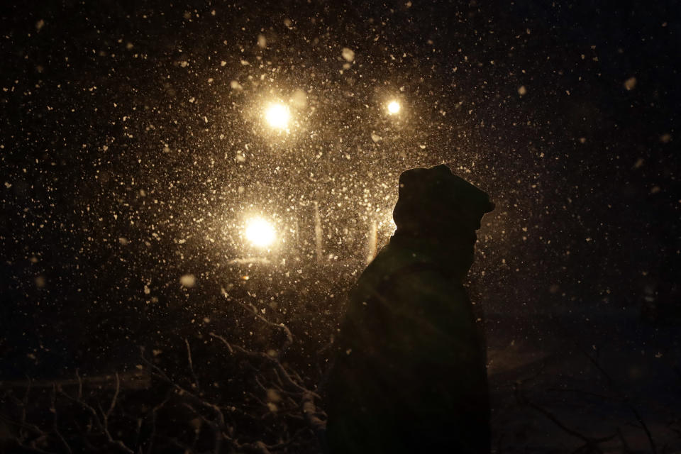 <p>Streets department worker James Ockimey clears a downed tree during a winter storm, Friday, March 2, 2018, in Marple Township, Pa. (Photo: Matt Slocum/AP) </p>