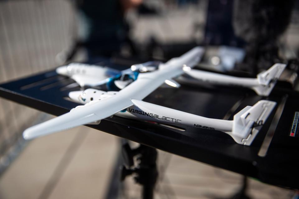 Models of Virgin Spaceship Unity sit are on display during the Galactic 02 Launch on Thursday, August 10, 2023, at Spaceport America.