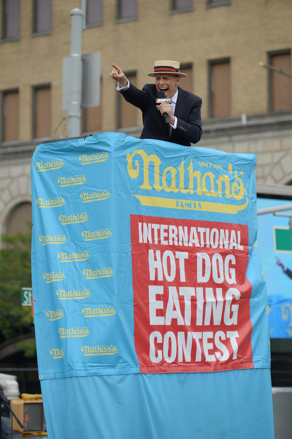 <p>George Shea kicks of the Nathan’s Famous Fourth of July International Hot Dog-Eating Contest at Coney Island in Brooklyn, New York City, U.S., July 4, 2017. (Erik Pendzich/REX/Shutterstock) </p>