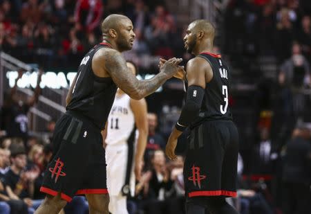 Dec 15, 2017; Houston, TX, USA; Houston Rockets guard Chris Paul (3) celebrates with forward PJ Tucker (4) after a play during the fourth quarter against the San Antonio Spurs at Toyota Center. Mandatory Credit: Troy Taormina-USA TODAY Sports