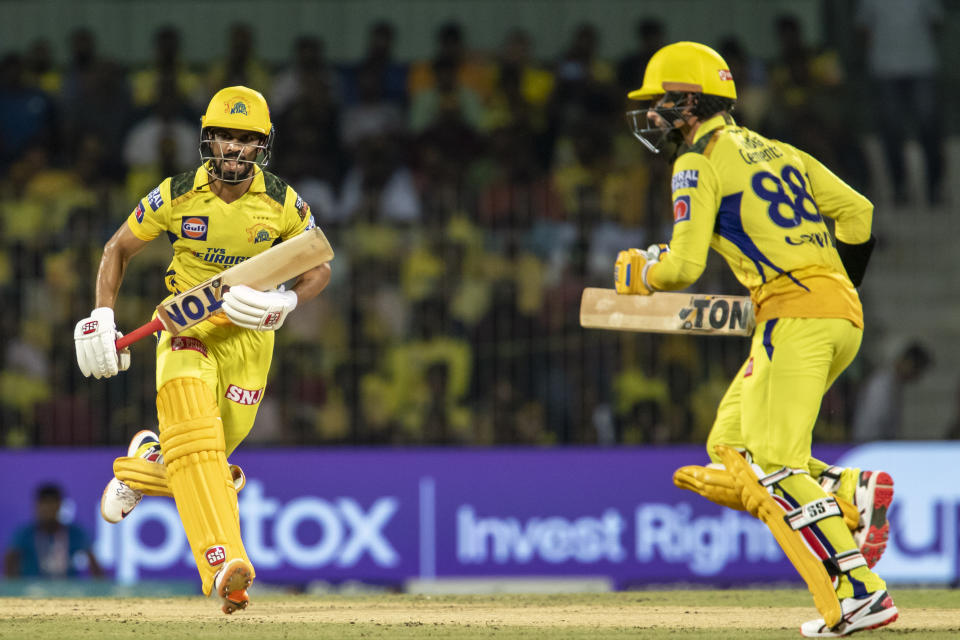 Chennai Super Kings' Ruturaj Gaikwad, left, and Devon Conway run between the wickets during the Indian Premier League qualifier cricket match between Chennai Super Kings and Gujrat Titans in Chennai, India, Tuesday, May 23, 2023. (AP Photo /R. Parthibhan)