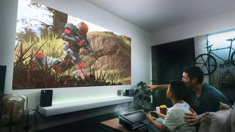  A father and son playing Halo on the Viewsonic X2-4K LED projector. 