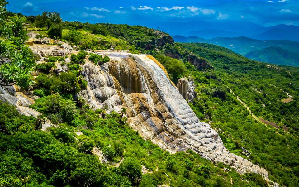 <p>This attraction appears to be a waterfall—but is actually a natural rock formation.</p>