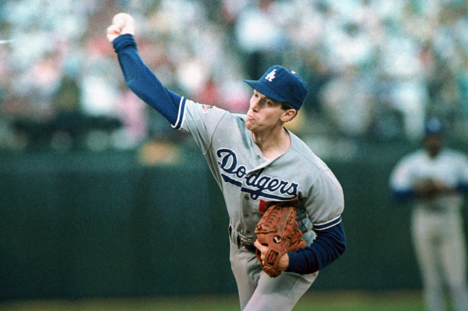 Los Angeles Dodgers pitcher Orel Hershiser hurls against the Oakland A's during first inning action of the fifth game of the World Series at Oakland Coliseum, Ca., Thursday, Oct. 20, 1988.  (AP Photo/Rusty Kennedy)