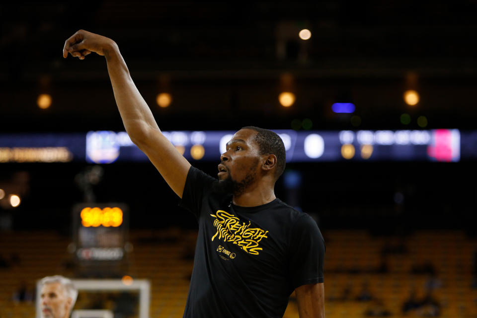 OAKLAND, CALIFORNIA - MAY 08: Kevin Durant #35 of the Golden State Warriors warms up before Game Five of the Western Conference Semifinals of the 2019 NBA Playoffs at ORACLE Arena on May 08, 2019 in Oakland, California. NOTE TO USER: User expressly acknowledges and agrees that, by downloading and or using this photograph, User is consenting to the terms and conditions of the Getty Images License Agreement. (Photo by Lachlan Cunningham/Getty Images)