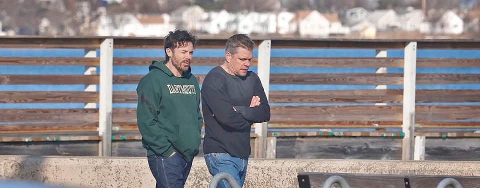 Casey Affleck and Matt Damon walk and talk near the Squantum Yacht Club at Wollaston Beach.