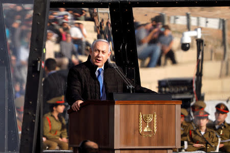 FILE PHOTO: Israeli Prime Minister Benjamin Netanyahu speaks at the Israeli Air Force pilots' graduation ceremony at Hatzerim air base in southern Israel, December 26, 2018. REUTERS/Amir Cohen/File Photo