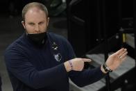 Memphis Grizzlies head coach Taylor Jenkins signals to his players during the first half of an NBA basketball game against the Milwaukee Bucks Saturday, April 17, 2021, in Milwaukee. (AP Photo/Morry Gash)