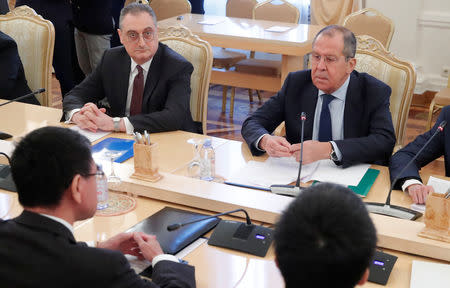 Russian Foreign Minister Sergei Lavrov (R) and his Japanese counterpart Taro Kono (L, front) attend a meeting in Moscow, Russia January 14, 2019. REUTERS/Maxim Shemetov