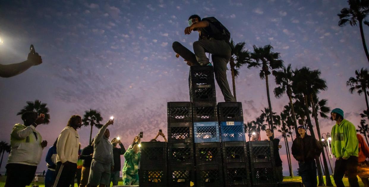 The milk crate challenge went viral in the summer of 2021. ER doctors weren't amused. <a href="https://www.gettyimages.com/detail/news-photo/man-walks-up-a-pyramid-of-milk-crates-while-he-participates-news-photo/1234866474" rel="nofollow noopener" target="_blank" data-ylk="slk:Apu Gomes/AFP/Getty Images;elm:context_link;itc:0;sec:content-canvas" class="link ">Apu Gomes/AFP/Getty Images</a>