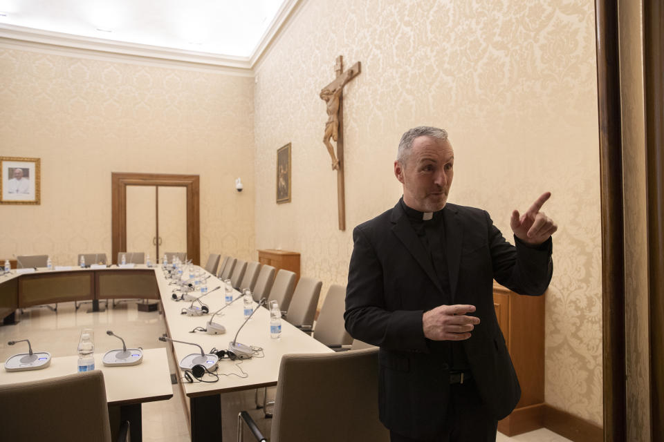 In this Monday, Dec. 9, 2019 photo, Monsignor John Kennedy, the head of the Congregation for the Doctrine of the Faith discipline section, speaks during an interview at the Vatican. Kennedy spoke to The Associated Press in the CDF’s inner chambers -- the first time in the tribunal’s history that visual news media have been given access. Even the Vatican’s most secretive institution now feels the need to show some transparency as the church hierarchy seeks to rebuild trust with rank-and-file Catholics who have grown disillusioned with decades of clergy abuse and cover-up. (AP Photo/Alessandra Tarantino)