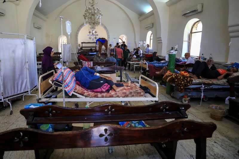 Gaza's Baptist Church turned into a clinic as patients and the wounded crowd hospitals