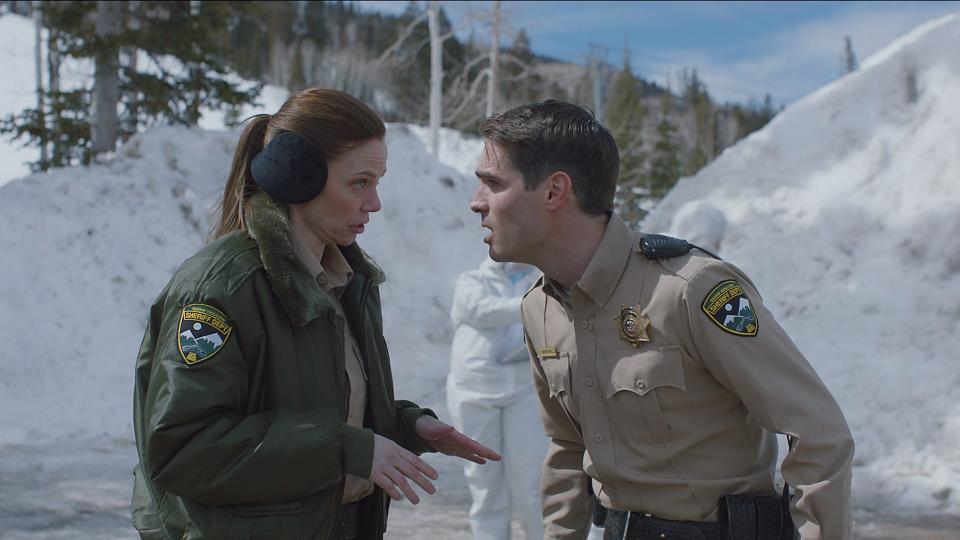 John Marshall (Jim Cummings, right, with Riki Lindhome) is a stressed-out cop in the horror comedy "The Wolf of Snow Hollow."