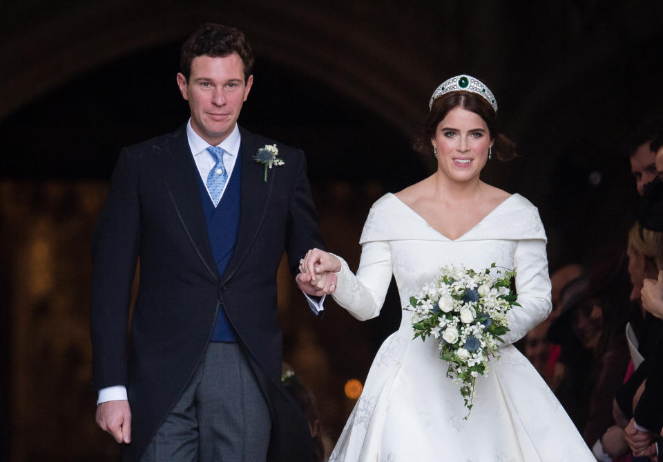 WINDSOR, ENGLAND - OCTOBER 12:  Princess Eugenie of York and Jack Brooksbank leave St George's Chapel in Windsor Castle following their wedding at St. George's Chapel on October 12, 2018 in Windsor, England.  (Photo by Pool/Samir Hussein/WireImage)