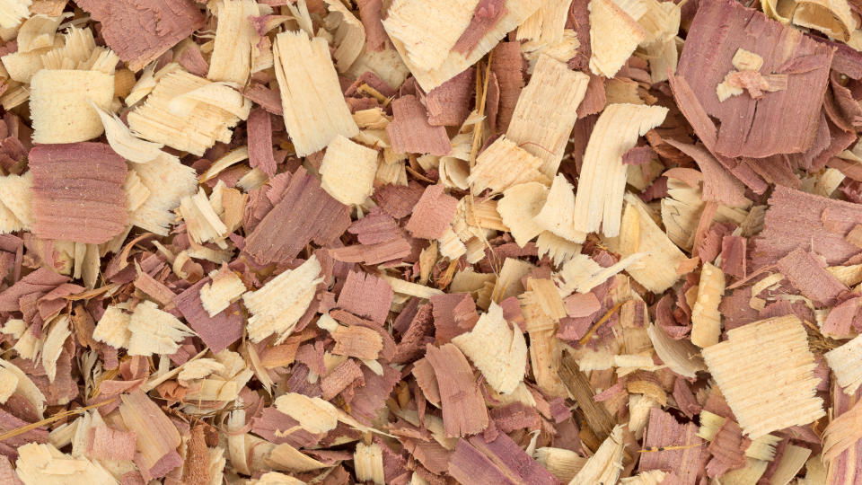 Cedarwood chips scattered on table to use as a moth balls alternative
