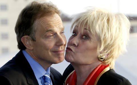  Tony Blair accepts a kiss from Dawn in 2004 - Credit: Simon Bellis/Reuters