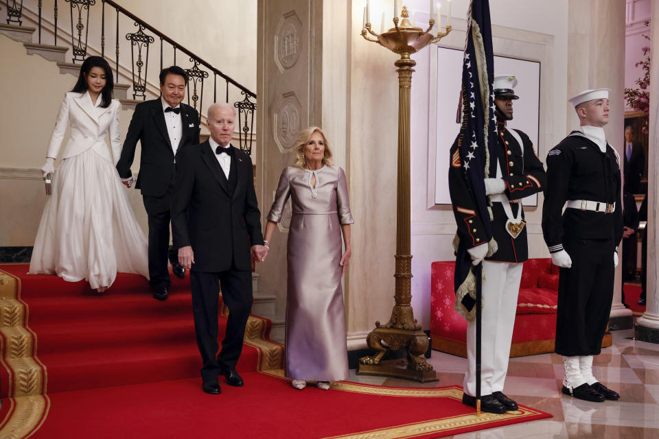 WASHINGTON, DC - APRIL 26: (L-R) South Korean first lady Kim Keon-hee, South Korean President Yoon Suk-yeol, U.S. President Joe Biden and first lady Jill Biden pose for photos at the Grand Staircase of the White House, April 26, 2023 in Washington, DC. President Joe Biden and first lady Jill Biden are hosting South Korean President Yoon Suk-yeol and South Korean first lady Kim Keon-hee for a state dinner. (Photo by Chip Somodevilla/Getty Images)