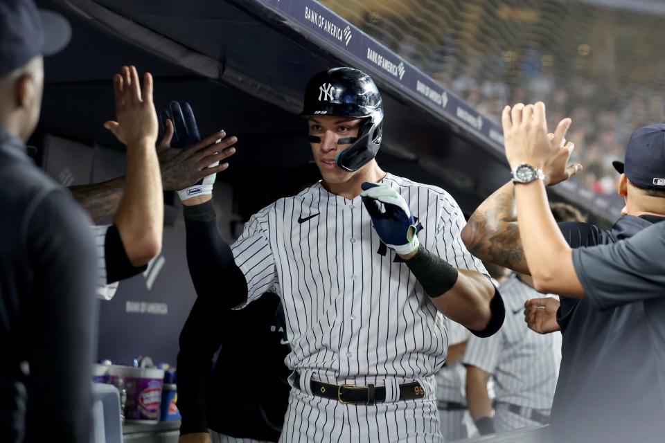 Aaron Judge celebrates his 60th homer of the season on Tuesday.