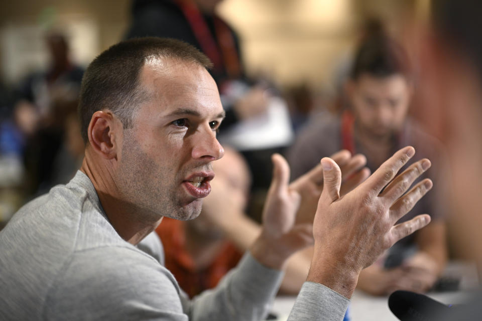 Arizona Cardinals head football coach Jonathan Gannon talks with reporters during an NFC coaches availability at the NFL owners meetings, Tuesday, March 26, 2024, in Orlando, Fla. (AP Photo/Phelan M. Ebenhack)