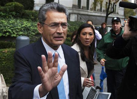 Former Goldman Sachs Group Inc board member Rajat Gupta departs Manhattan Federal Court after being sentenced in New York in this file photo taken October 24, 2012. REUTERS/Lucas Jackson/Files