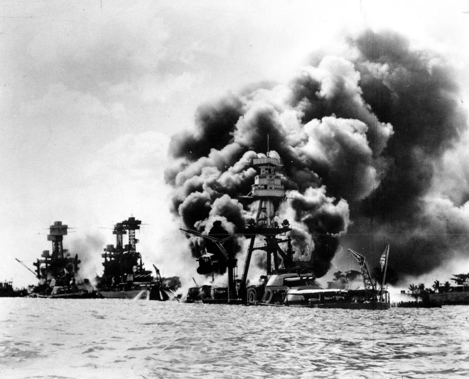 <p>Three U.S. battleships are hit from the air during the Japanese attack on Pearl Harbor on Dec. 7, 1941. From left are: USS West Virginia, severely damaged; USS Tennessee, damaged; and USS Arizona, sunk. (AP Photo) </p>